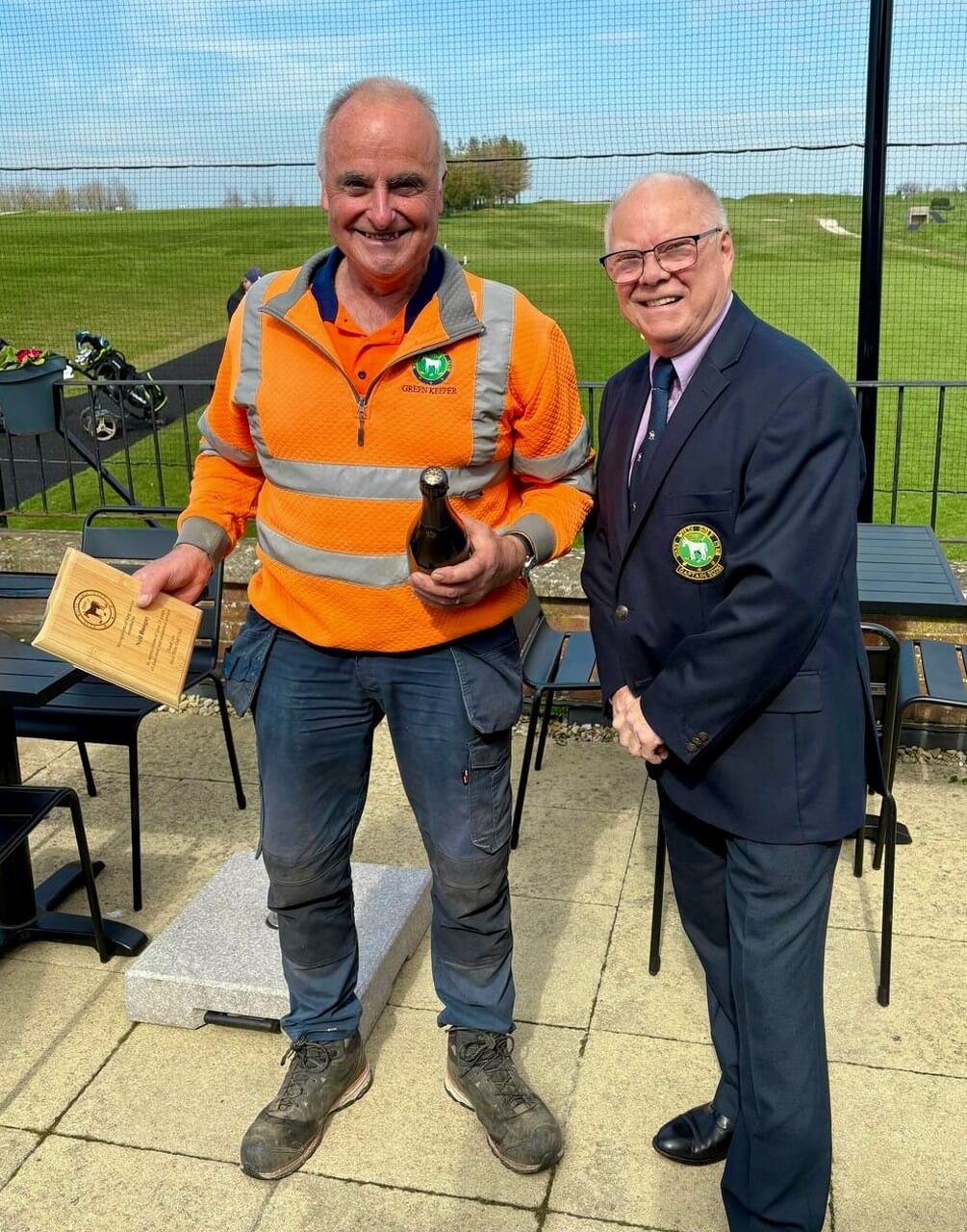 Neil Bungay and Colin presenting 25 years award