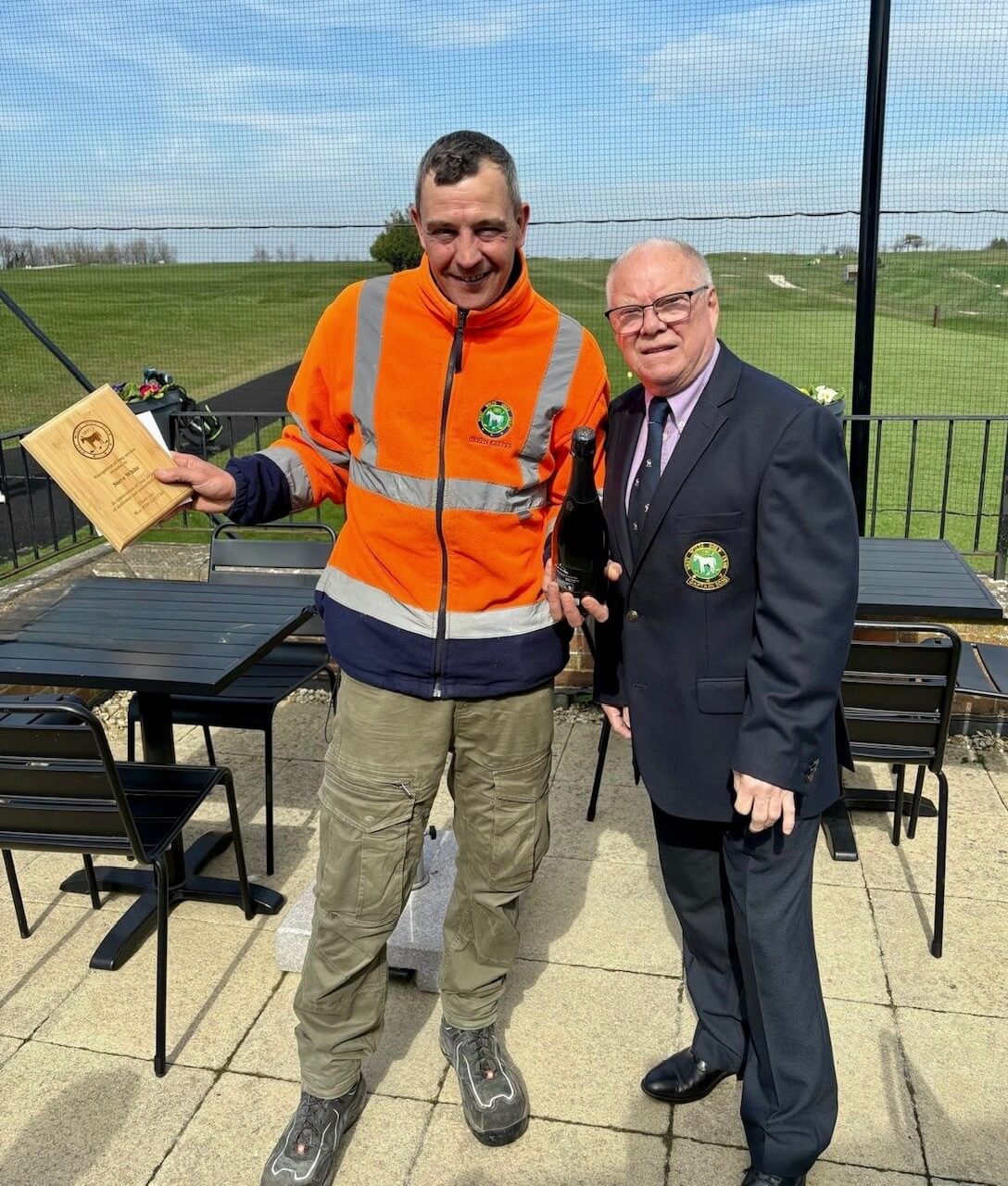 Steve White and Colin presenting 20 years award