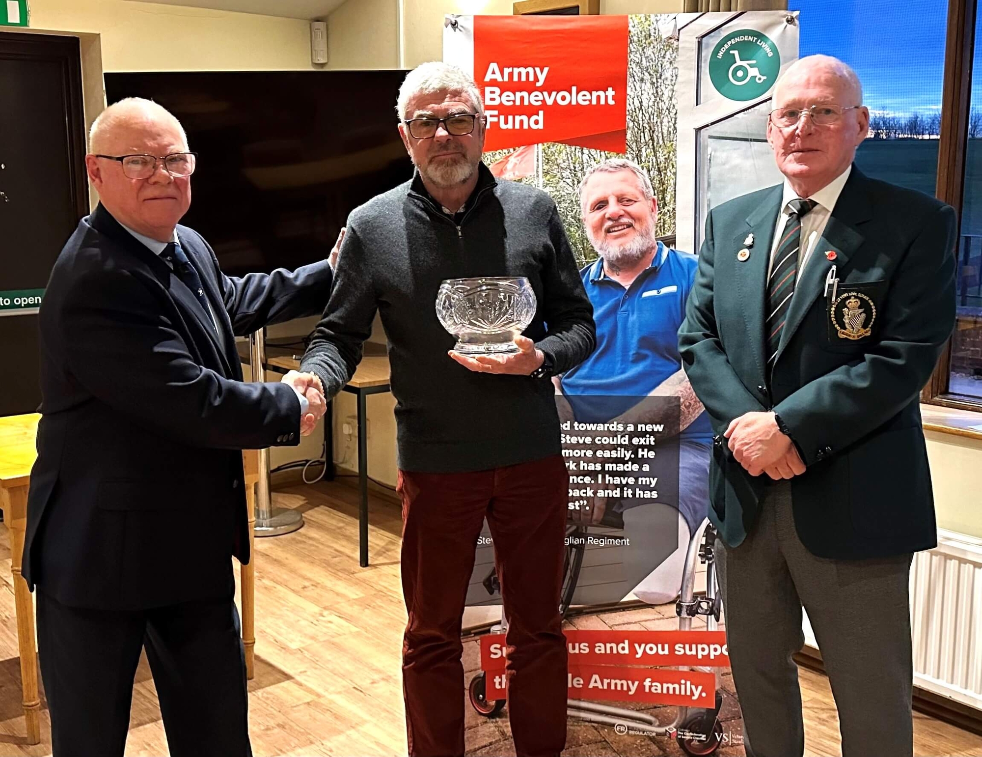 Colin presenting the Royal Irish Trophy to Charles McFarland - guest player